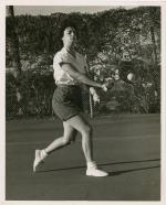 Student Sandy Southmayd playing tennis