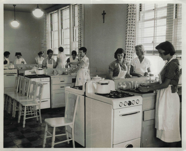 Sister Eulalia LaVoie instructs a cooking class in the Foods Laboratory