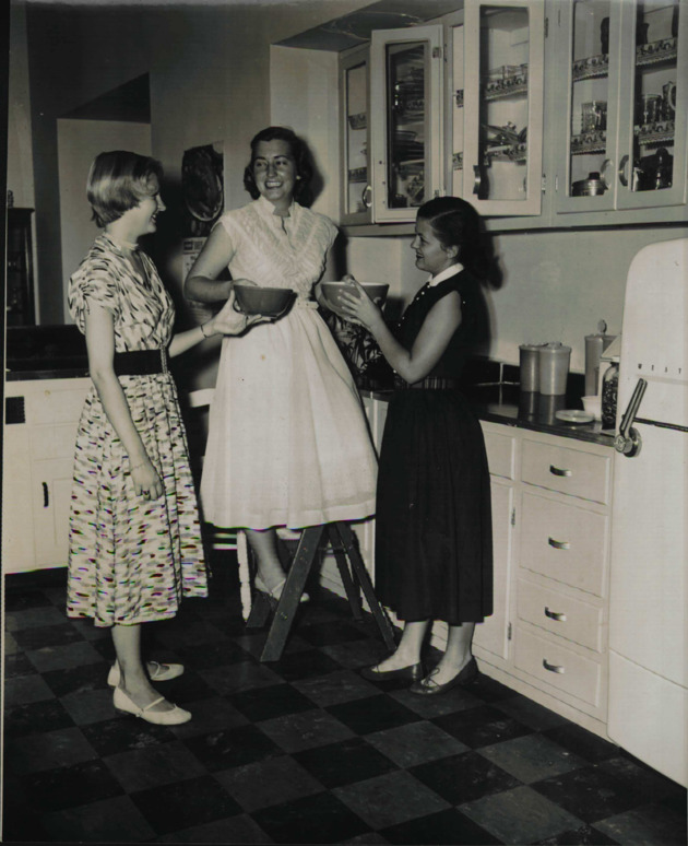 Students in the kitchen of the Practice House