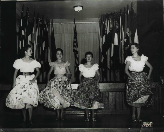 Four dancers doing a native Venezuelan dance called 'Joropo'