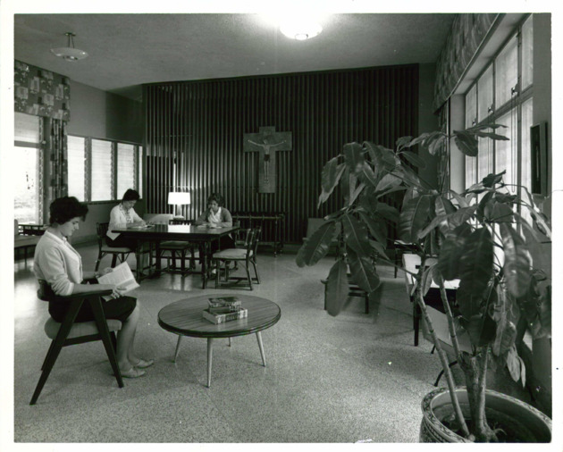 Day students lounge at the Fine Arts Quadrangle
