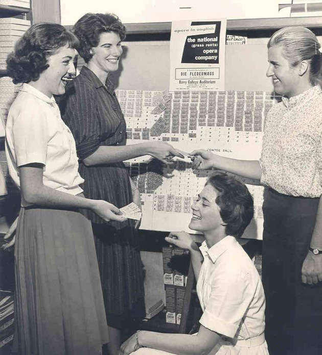Junior class officers advertising the benefit performance of the National Grass Roots Opera Company at Barry