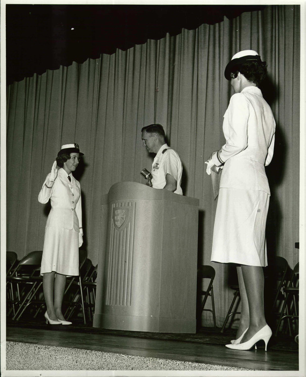 Cathy Campo at her graduation ceremony takes the Oath of Enlistment to the U. S. Navy