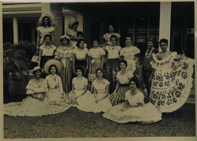 Barry students pose in Latin attire in the Fine Arts Quadrangle