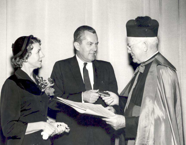 John Thompson receives Laudare Medal from Monsignor William Barry