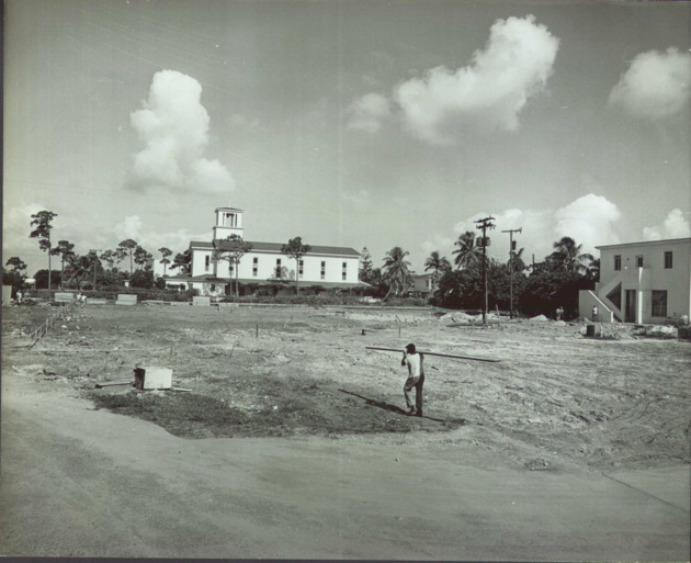 Beginning of the construction of Thompson Hall with a view of Cor Jesu Chapel far behind