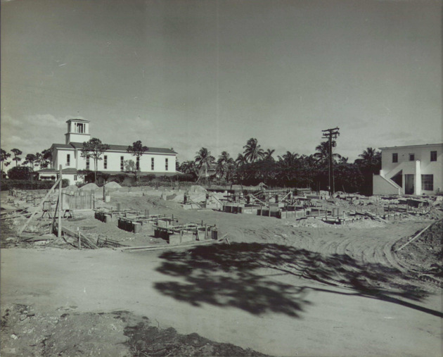 Thompson Hall construction site with a Cor Jesu Chapel in the background