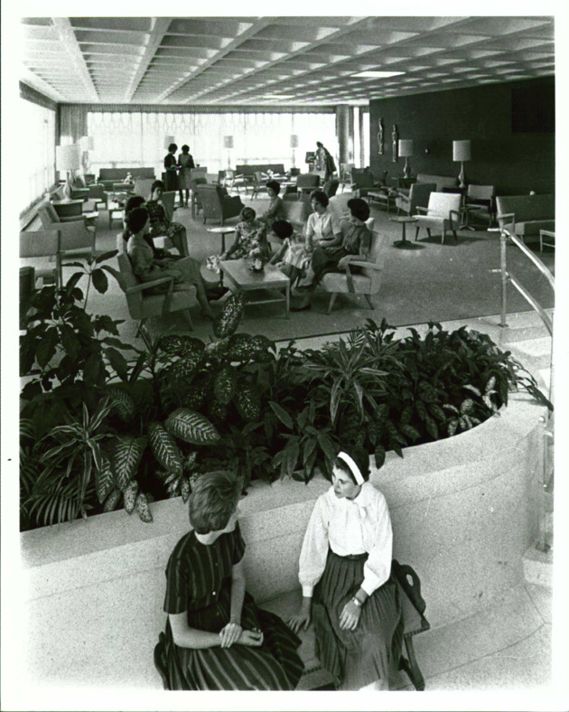 Students in the lobby of  Dalton-Dunspaugh Residence Hall