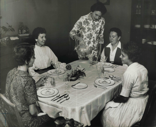 Home Economics Club officers enjoy a formal dinner