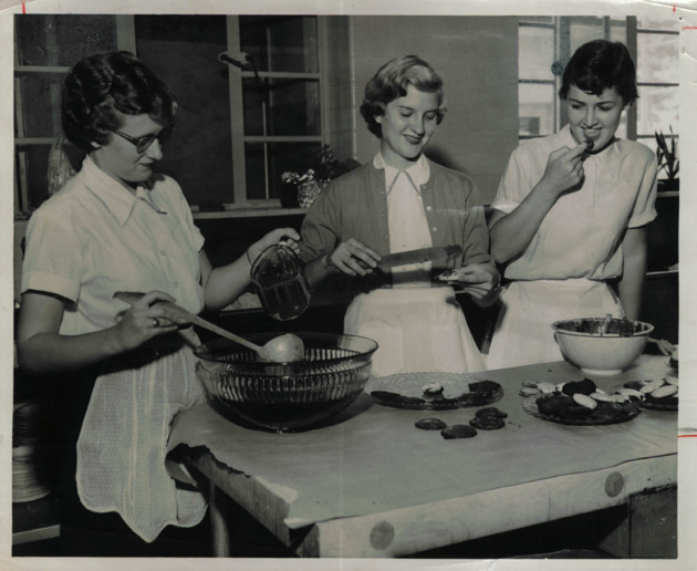Members of the Barry College Catering Service prepare for a party
