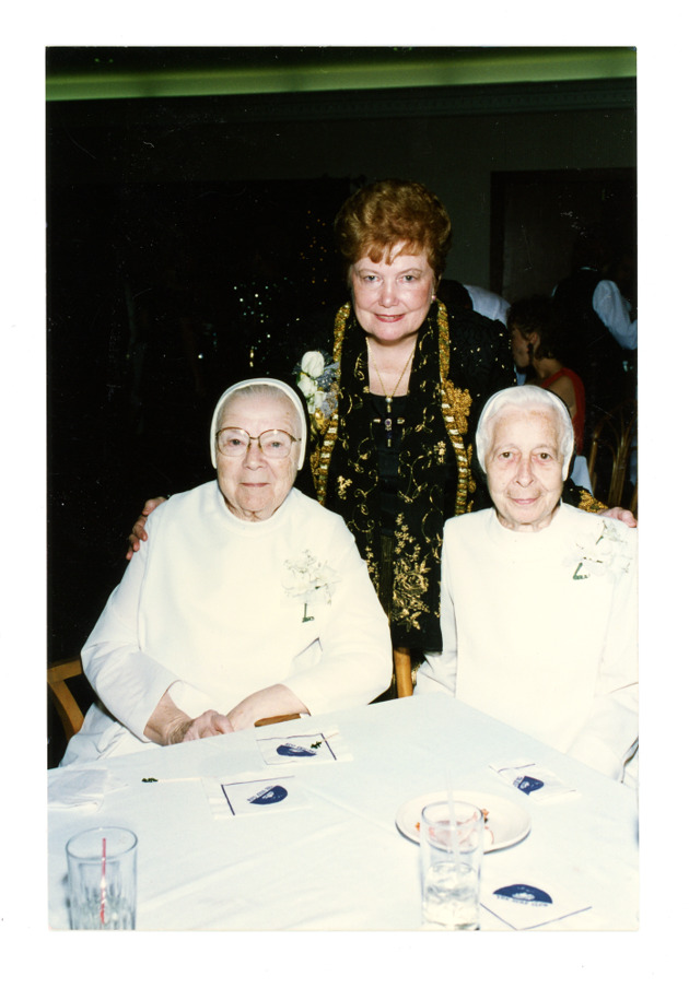 Sister Jeanne O'Laughlin, O.P., Mother Genevieve and Sister Trinita at a dinner ceremony