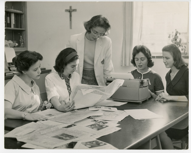 Angelicus editorial staff working on the newspaper