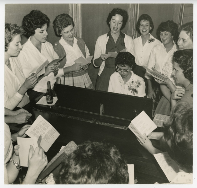 Students singing with piano accompaniment
