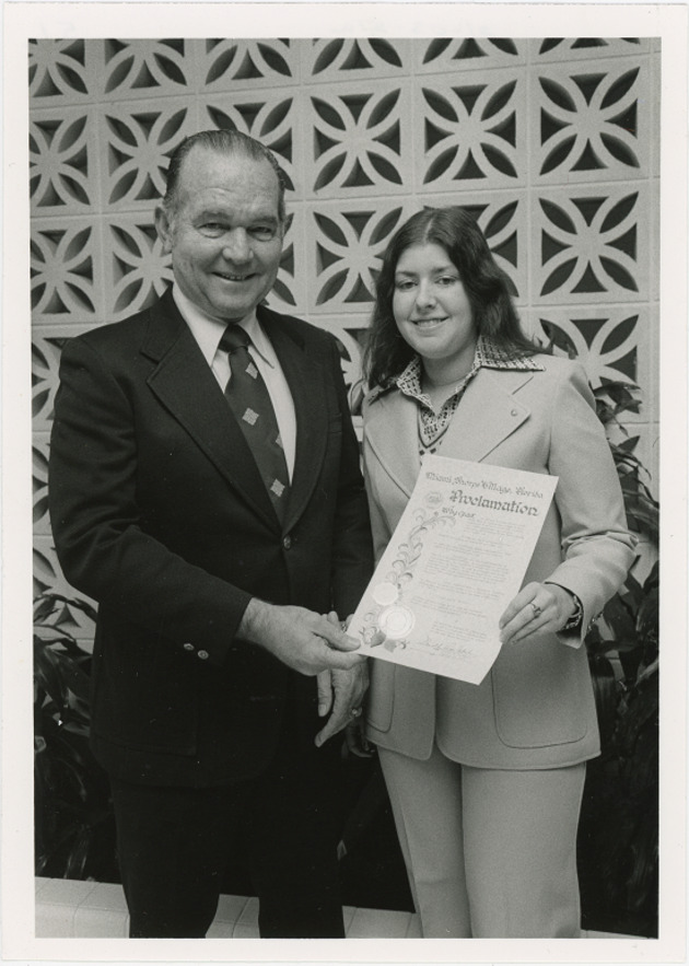 Mayor Donald W. McIntosh presents Circle K Club president Terri Diamond with a proclamation